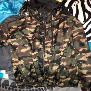 Camo “don’t care” windbreaker